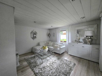 Zweifamilienhaus mit Doppelgarage, Wellnessbereich und liebevoll gestaltetem Garten