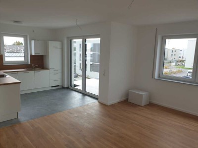 Tolle Neubau Wohnung mit Terrasse und Garten