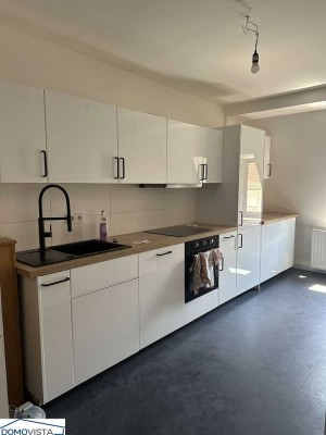 Bezugsfrei Familienwohnung mit Stellplatz & Einbauküche in zentraler Lage