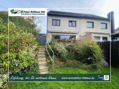 **Sankt Augustin-Menden: Charmante Doppelhaushälfte
mit Garten und Garage**
