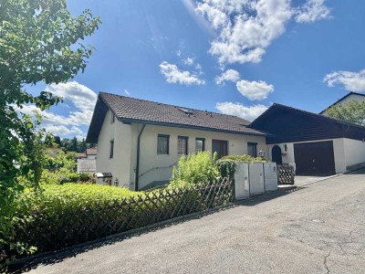 Einfamilienhaus mit Einliegerwohnung in Top-Lage