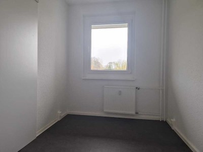 Charmante Erdgeschosswohnung mit Balkon und separater Küche !