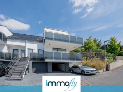 Architektur trifft Achtsamkeit: Stilvolle Etagenwohnung mit Bergblick, Terrasse & grüner Technik