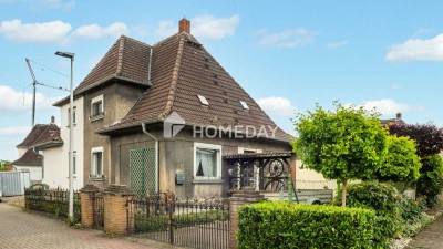 Gemütliche Doppelhaushälfte mit Charme, Gartenidylle und Potenzial
