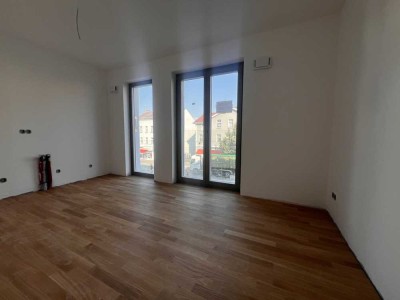 SPECIAL OFFER: Berliner Allee: ERSTBEZUG im NEUBAU per 2025 : u.a. 1-Zi- EG- Wohnung mit TERRASSE