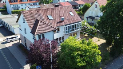 Zweifamilienhaus mit einer Wohnung und einer Gewerbeeinheit/Praxis - Herzogenaurach-Schulzentrum Süd