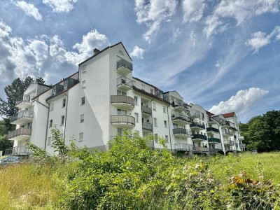 Vermietete 2 Zi. Wohnung, Balkon, ca. 60 m², TG-Stellplatz, idyllische Lage im Grünen