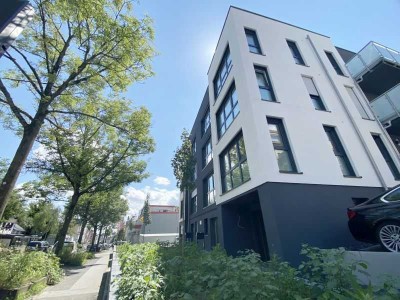 Neubauwohnung - Parknähe mit Balkon, Aufzug & Garage