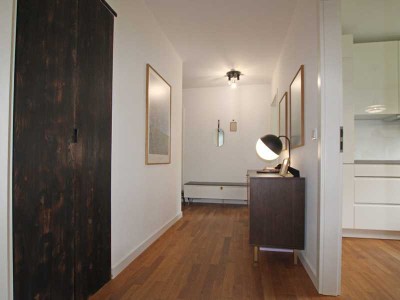 Stilvolle 3-Zimmer-Erdgeschosswohnung mit Garten, Tiefgaragenstellplatz und exklusiver Ausstattung