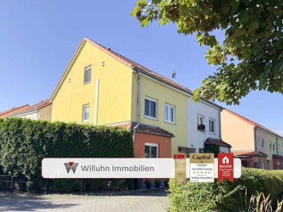 Direkt einziehen! Ca. 123 m² Wohnfläche mit grünem Eckgrundstück | 2 Bäder | Einbauküche | Nahwärme
