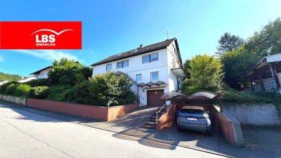 Traumhaftes 1-2 Familienhaus auf tollem Hanggrundstück