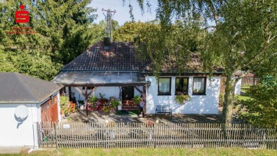Lebenslanges Wohnrecht! Naturnahes Wohnen: Isartaler Holzhaus auf großzügigem Grund