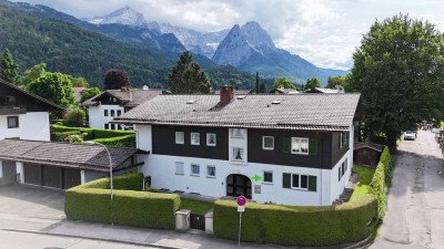 2- Zimmer, Terrasse, Alpspitzblick – und das Ganze ruhig und mitten im Ort!