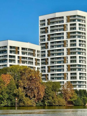 Direkt am Main gelegen - Lichtdurchflutete Eleganz mit Balkon und moderner Einbauküche in "Erstbezug