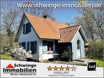 Wohnhaus am Deich der Oste mit Bootsanleger in ruhiger Wohnlage zu verkaufen!