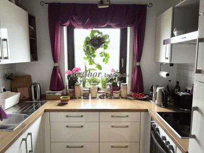 Gut vermietete 2 Zimmer-Mansardenwhg mit Loggia und Stellplatz in ruhiger Wohnlage