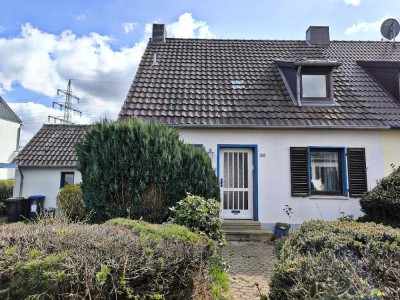 Charmantes Siedlungshaus mit Erweiterungsmöglichkeit auf großem Grundstück