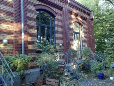 Schöne Galeriewohnung mit Terrasse in einem historischen Gebäude