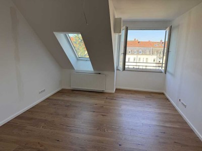 Neubau DG-Wohnung mit EBK und Keller