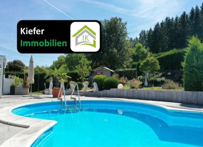 Einfamilienhaus mit traumhaften Pool und Gartenparadies