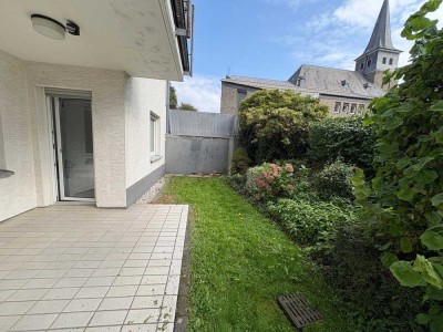 Frisch renovierte Souterrainwohnung mit Terrasse und Garteinanteil