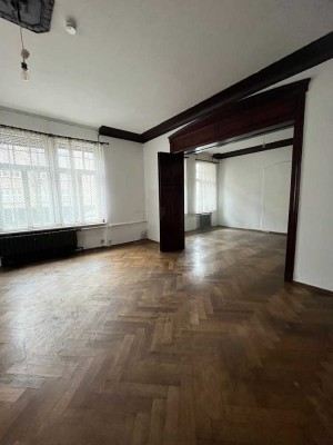 Denkmalgeschütztes Mehrfamilienhaus mit Entwicklungspotential