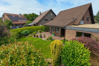Freistehendes Einfamilienhaus mit Wintergarten, Doppelgarage & gepflegtem Garten in Jüchen