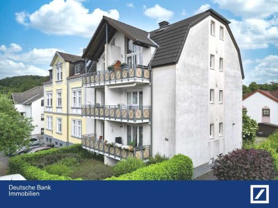 Charmante Maisonettewohnung mit Balkon in gepflegtem Mehrfamilienhaus