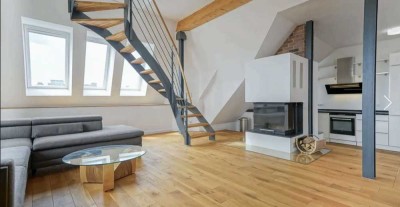 Großzügige Dachgeschosswohnung mit grosser 360-Grad-Dachtterrasse in Top-Lage