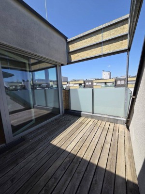 Coole Dachgeschosswohnung mit Terrasse in Holzbauweise
