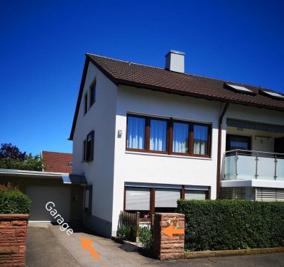 Attraktive 3,5-Zimmer-Wohnung mit großem Garten, Wintergarten, Garage, und Hobbyraum