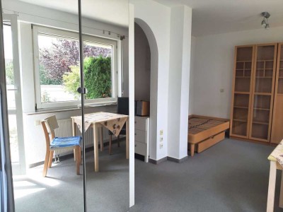 Ruhige 1-Zimmer-Gartenwohnung, TG, teilmöbl., zentral, frei