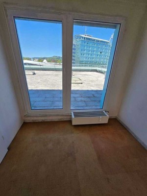 DG-Wohnung mit 2 Terrassen in Citylage