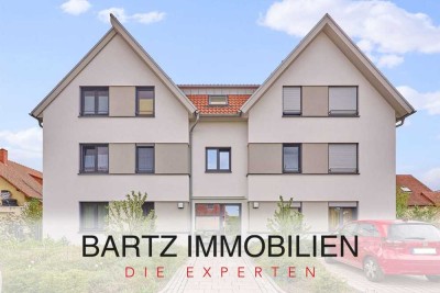 Müller-Bau: Lichtdurchflutete Dachgeschosswohnung mit Süd-Balkon, EBK & Tiefgaragenstellplatz