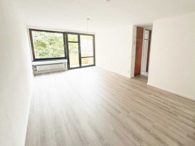 Renovierte Wohnung mit Balkon, Garten und Tiefgarage direkt am Schlosspark Strünkede
