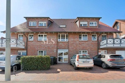 Vier Zimmer auf zwei Ebenen mit Terrasse, Gartenanteil, Garage und rund 132 m² Wohnfläche