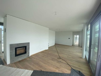 Exklusives Penthouse mit Kaminofen