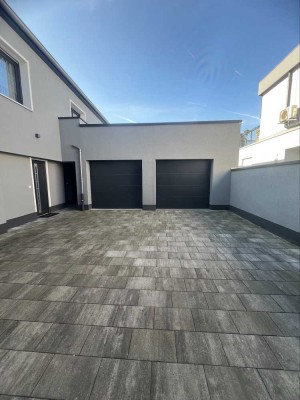 Geschmackvolle, neuwertige 2-Raum-Bungalow-Wohnung mit luxuriöser Innenausstattung & eigenem Garten