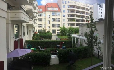 Neubau in Mitte - außergewöhliche 4-Zi.-Maisonette-Wohnung mit Terrasse und Garten