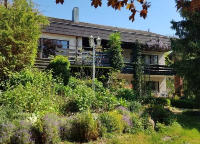 Familienfreundliches Einfamilienhaus mit Einliegerwohnung – Vielseitiges Raumwunder!