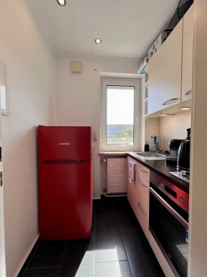 BEFRISTET(1.8.-29.09.25) Helle 1,5-Zimmer Wohnung mit großzügiger Dachterrasse