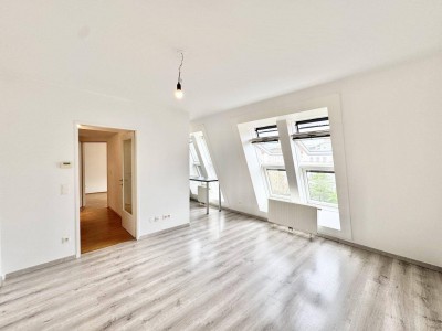 Nähe U1 | 2 Zimmer Dachgeschosswohnung mit Gemeinschaftsdachterrasse