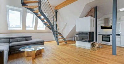 Großzügige Dachgeschosswohnung mit Terrasse in Top-Lage
