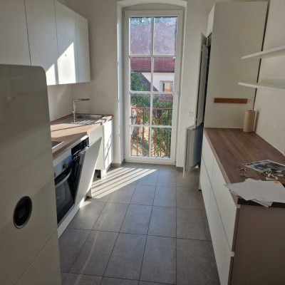 Kernsanierte Wohnung am Petrusplatz mit großem Balkon