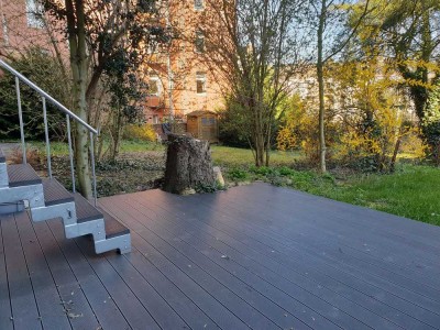 Sanierte Souterrain-Wohnung mit Einbauküche und Terrasse