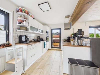 Attraktive Mietwohnung mit eigenem Garten, Terrasse und hochwertiger Einbauküche zu vermieten