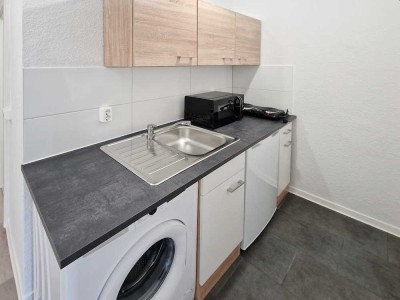 Mit den Lift in eurer neues Wohnglück - 1-Zimmer-Wohnung mit Einbauküche ruft!