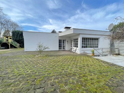 Zentral gelegen, grün umgeben: 
Bungalow mit ausgebautem Souterrain