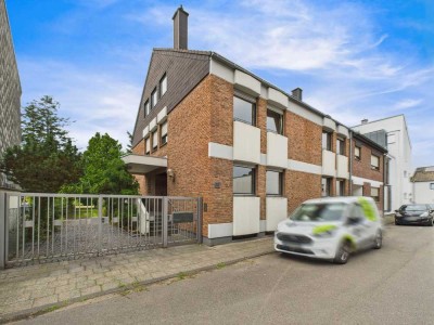 Repräsentatives Mehrfamilienhaus mit Gewerbeeinheit auf parkähnlichem Grundstück!