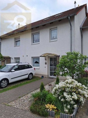 Familienfreundliches Reihenmittelhaus in ruhiger Lage – mit Carport